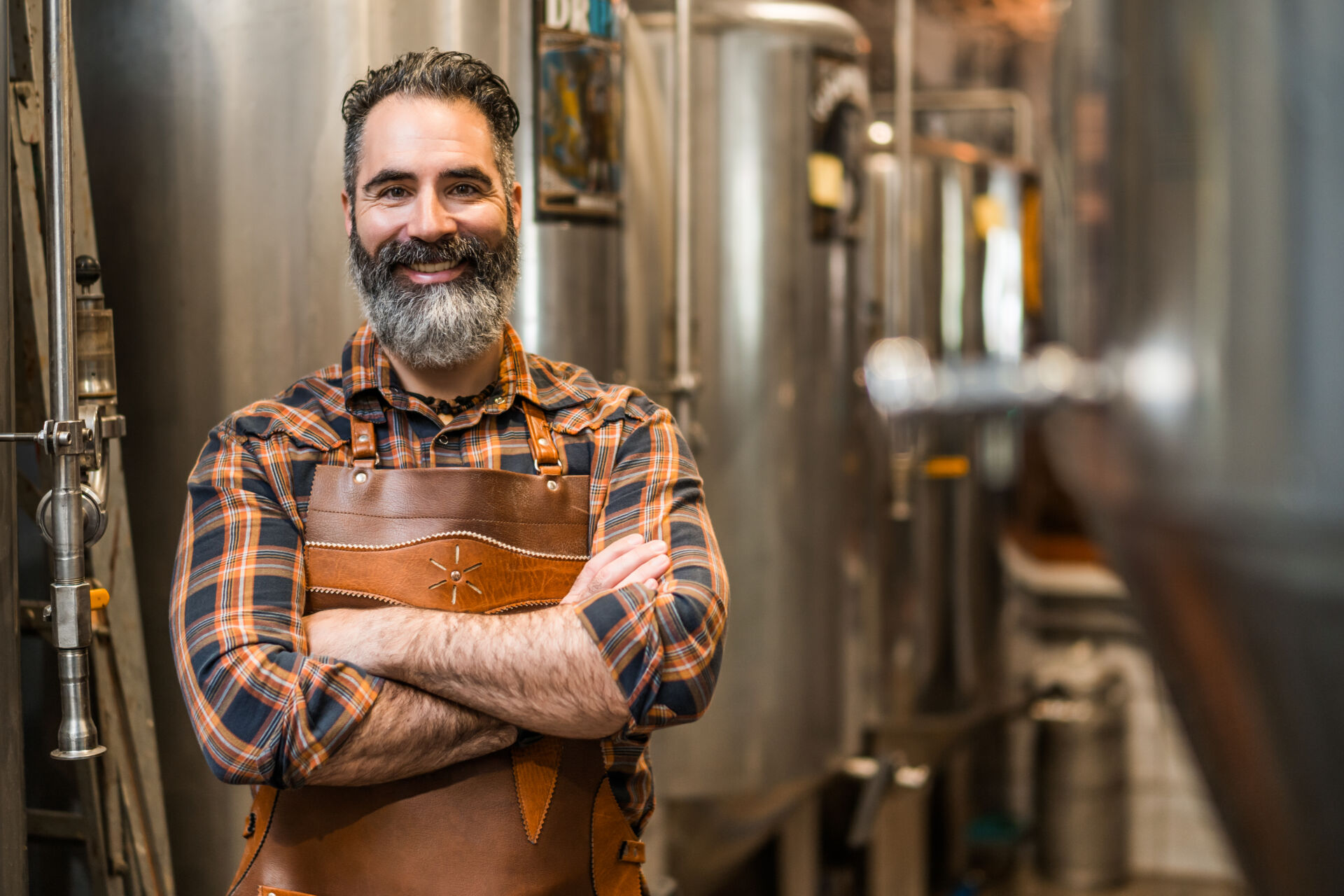 man-working-in-brewery-2023-11-27-05-00-42-utc